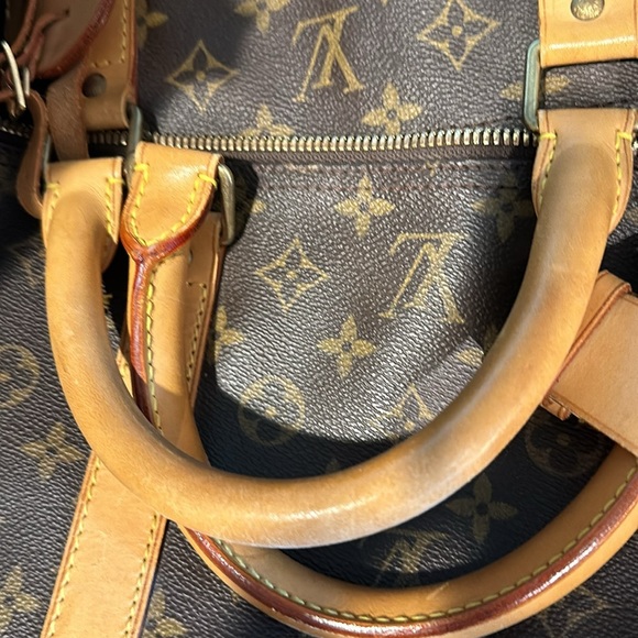 LV DUFFLE BAG WITH DATE STAMP OF MB0033 - MADE IN FRANCE 3RD WEEK OF 2003. - Picture 12 of 15